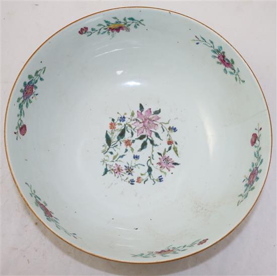 A Chinese famille rose European subject punch bowl, Qianlong period, diameter 31.5cm, hairline cracks